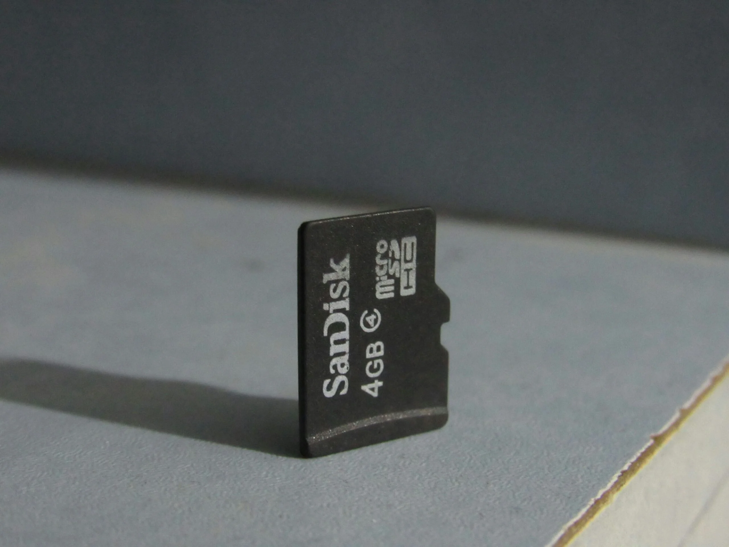 A close up of a micro sd memory card